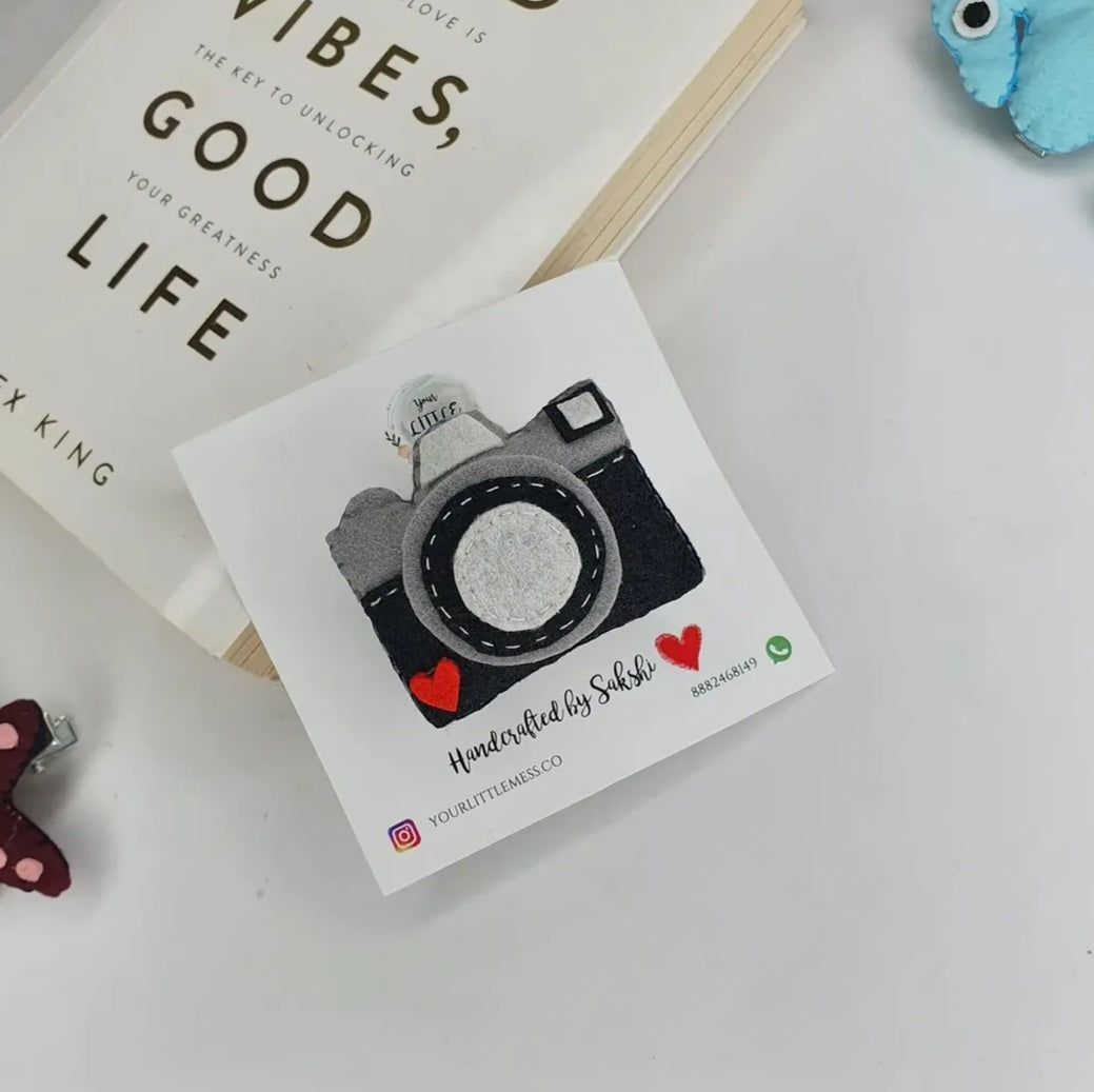 CAMERA HAIRCLIP